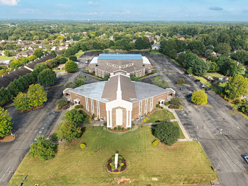 Overhead aerial of a church and surrounding neighborhood