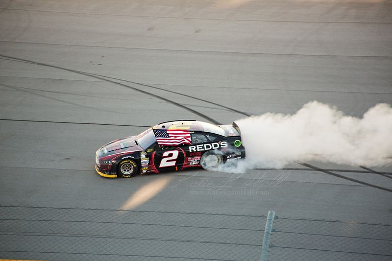 Race car doing a celebratory burnout