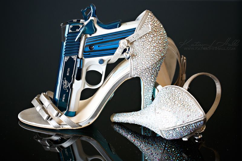 Jeweled heels and a custom pistol, product shot